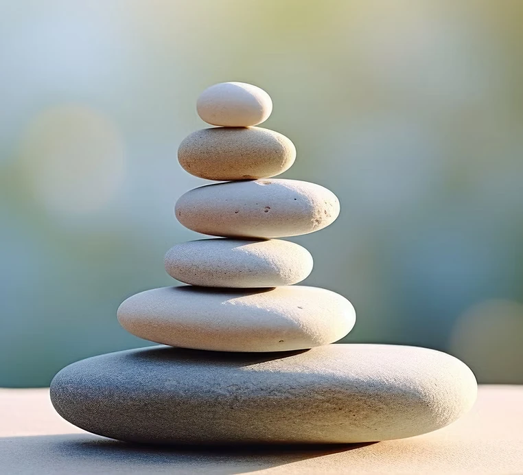 Balanced Reiki stones in a calm, softly focused setting